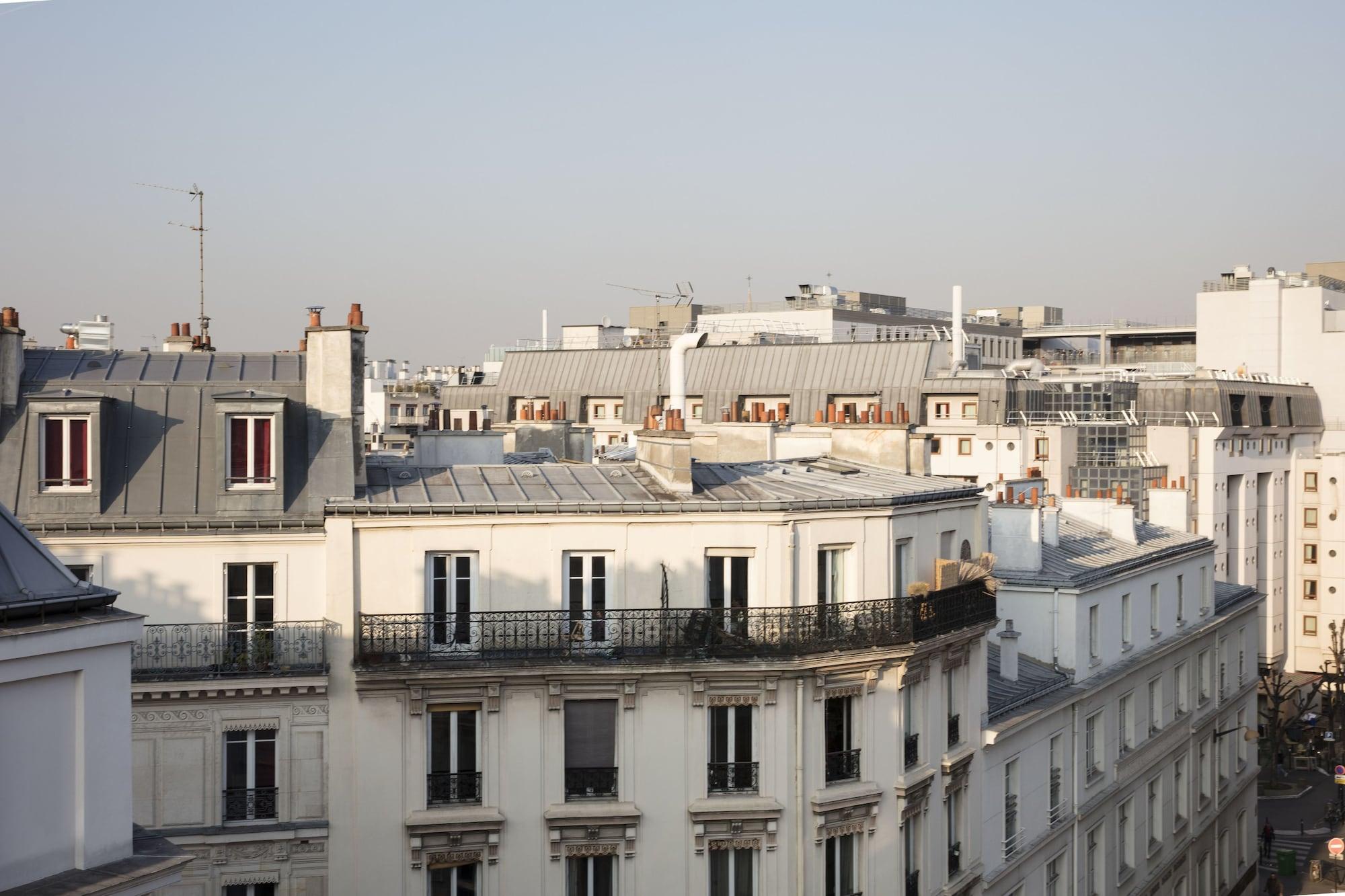 Maison Breguet Paris Exterior photo Haussmann apartment buildings in Paris